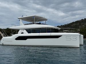Leopard 53 Powercat 2023 Leopard 53 Powercat yacht on calm water, overcast sky background.