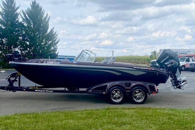 Ranger 620FS Pro 2022 Ranger 620FS Pro boat on trailer, parked outdoors under cloudy sky.