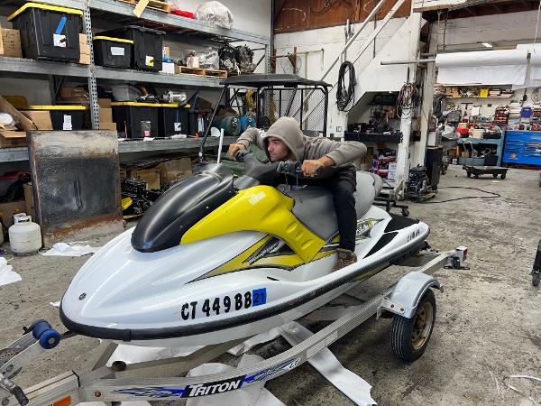Yamaha WaveRunner GP 800R 2005 Yamaha WaveRunner GP 800R in a workshop, person sitting on it.