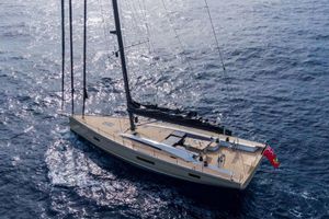 Maxi Dolphin 62 Luxurious 2020 Maxi Dolphin 62 yacht sailing on open sea, showcasing sleek design and elegance.