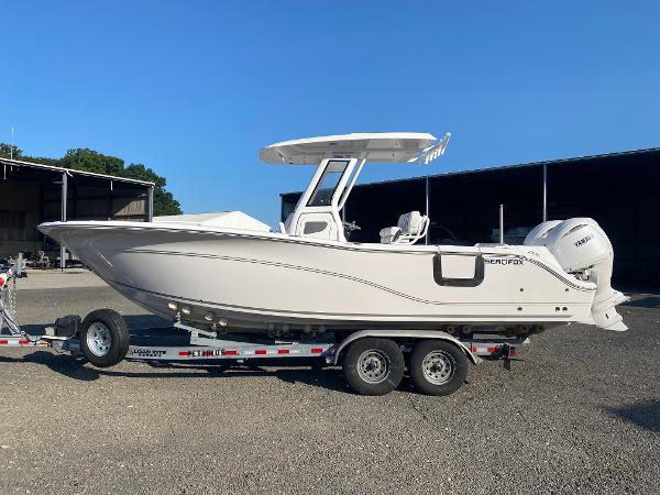 Sea Fox 268 Commander 2025 Sea Fox 268 Commander boat on trailer, parked outdoors.