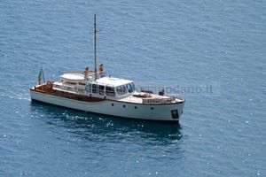Rampart 48 Classic 1967 Rampart 48 yacht cruising on calm blue waters.