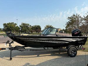 Ranger VS1782SC Angler 2024 Ranger VS1782SC Angler boat on trailer, parked outdoors.