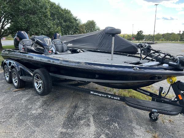 Ranger Z521R Ranger Cup Equipped 2024 Ranger Z521R Ranger Cup Equipped boat on a trailer in a parking lot.