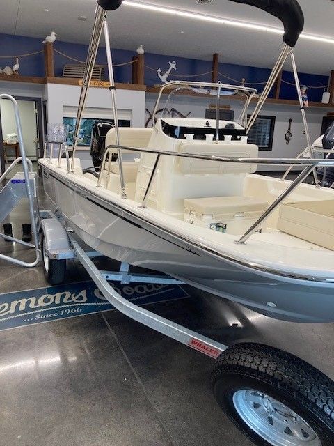Boston Whaler 150 Montauk 2023 Boston Whaler 150 Montauk boat on display in showroom.