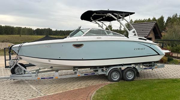 Cobalt R5 2020 Cobalt R5 boat on a trailer in a driveway.