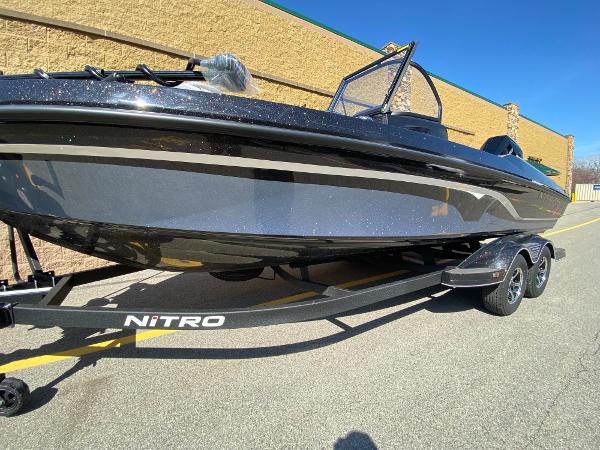 Nitro ZV21 Pro 2025 Nitro ZV21 Pro boat on trailer, parked outdoors, sunny day.