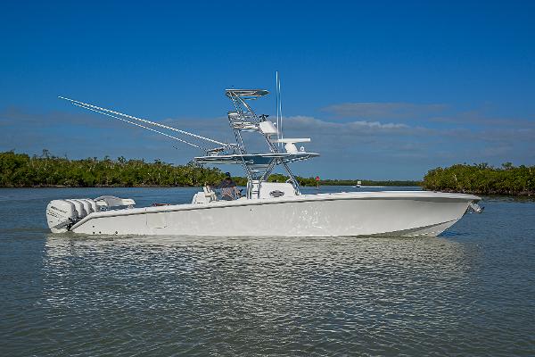 Bahama 41 2019 Bahama 41 boat cruising on calm water under clear blue sky.