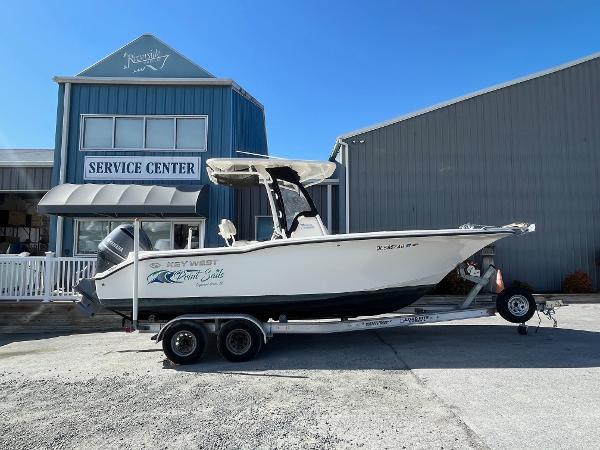 Key West 244 Center Console 2019 Key West 244 Center Console boat on trailer outside service center.