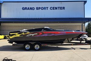 Baja 25 Outlaw 2005 Baja 25 Outlaw speedboat with vibrant graphics at Grand Sport Center.