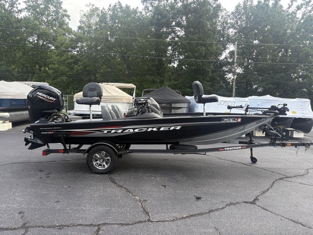 Tracker Pro Team 175 TXW 2023 Tracker Pro Team 175 TXW® boat on trailer, parked outdoors.