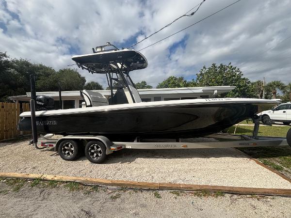 ShearWater 260 Carolina Bay 2016 ShearWater 260 Carolina Bay boat on trailer, parked outdoors.