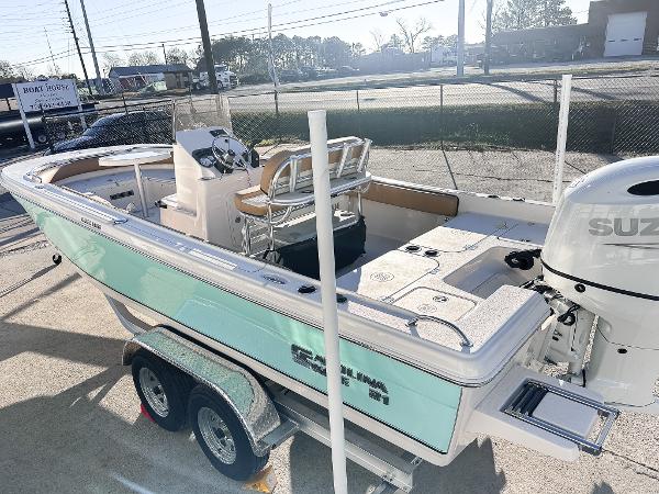 Carolina Skiff 21 Ultra Elite 2025 Carolina Skiff 21 Ultra Elite boat on trailer, featuring a sleek design and spacious deck.