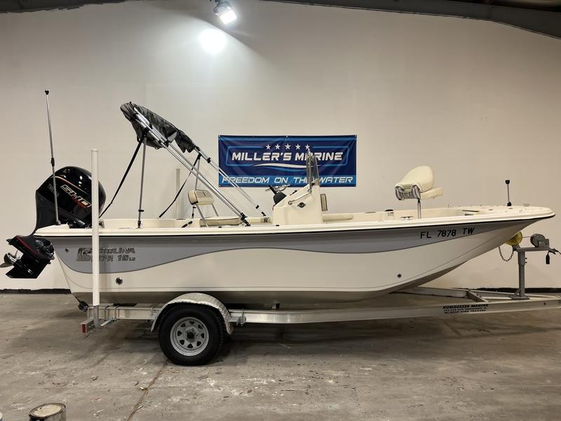 Carolina Skiff 19 LS 2024 Carolina Skiff 19 LS boat on trailer at Miller's Marine showroom.