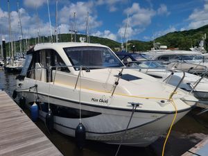 Quicksilver 855 Weekend Quicksilver 855 Weekend 2018 boat docked at marina under blue sky.