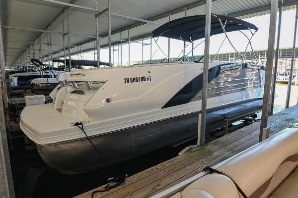 Marker One M27 2017 Marker One M27 boat docked under covered marina.