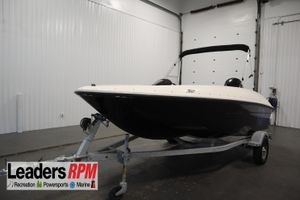 Bayliner 16 Element 2021 Bayliner 16 Element boat on trailer in indoor showroom.