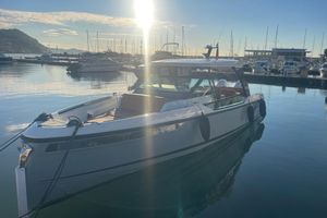 Saxdor 320 GTO 2025 Saxdor 320 GTO yacht docked in a serene marina at sunrise.