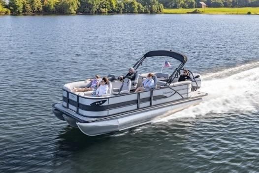 Bentley Pontoons Legacy 223 Navigator 2026 Bentley Pontoons Legacy 223 Navigator cruising on a serene lake with passengers.
