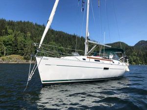Beneteau 361 2003 Beneteau 361 sailboat on calm water, surrounded by lush green forest.