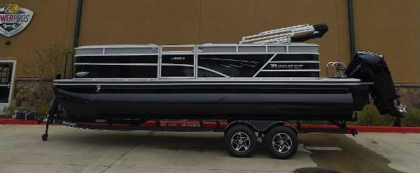 Ranger Reata 223C 2024 Ranger Reata 223C pontoon boat on a trailer.