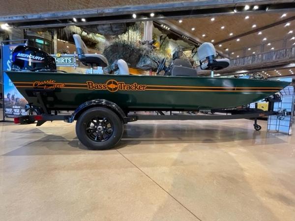 Tracker Bass Tracker Classic Limited 2025 Tracker Bass Tracker Classic Limited boat displayed indoors on a trailer.
