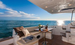 Azimut 54 Fly Luxurious 2015 Azimut 54 Fly yacht interior with ocean view and elegant seating area.