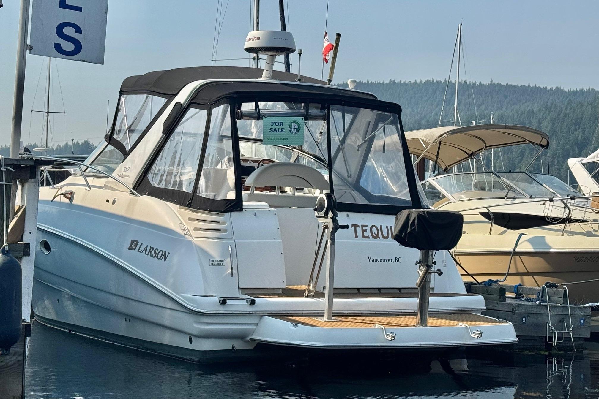Larson 330 CABRIO 2000 Larson 330 Cabrio boat docked, for sale in Vancouver, BC.