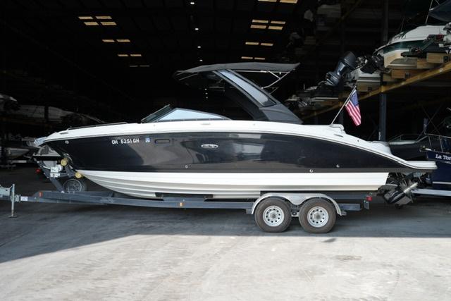 Sea Ray SDX 270 2022 Sea Ray SDX 270 boat on trailer in a storage facility.