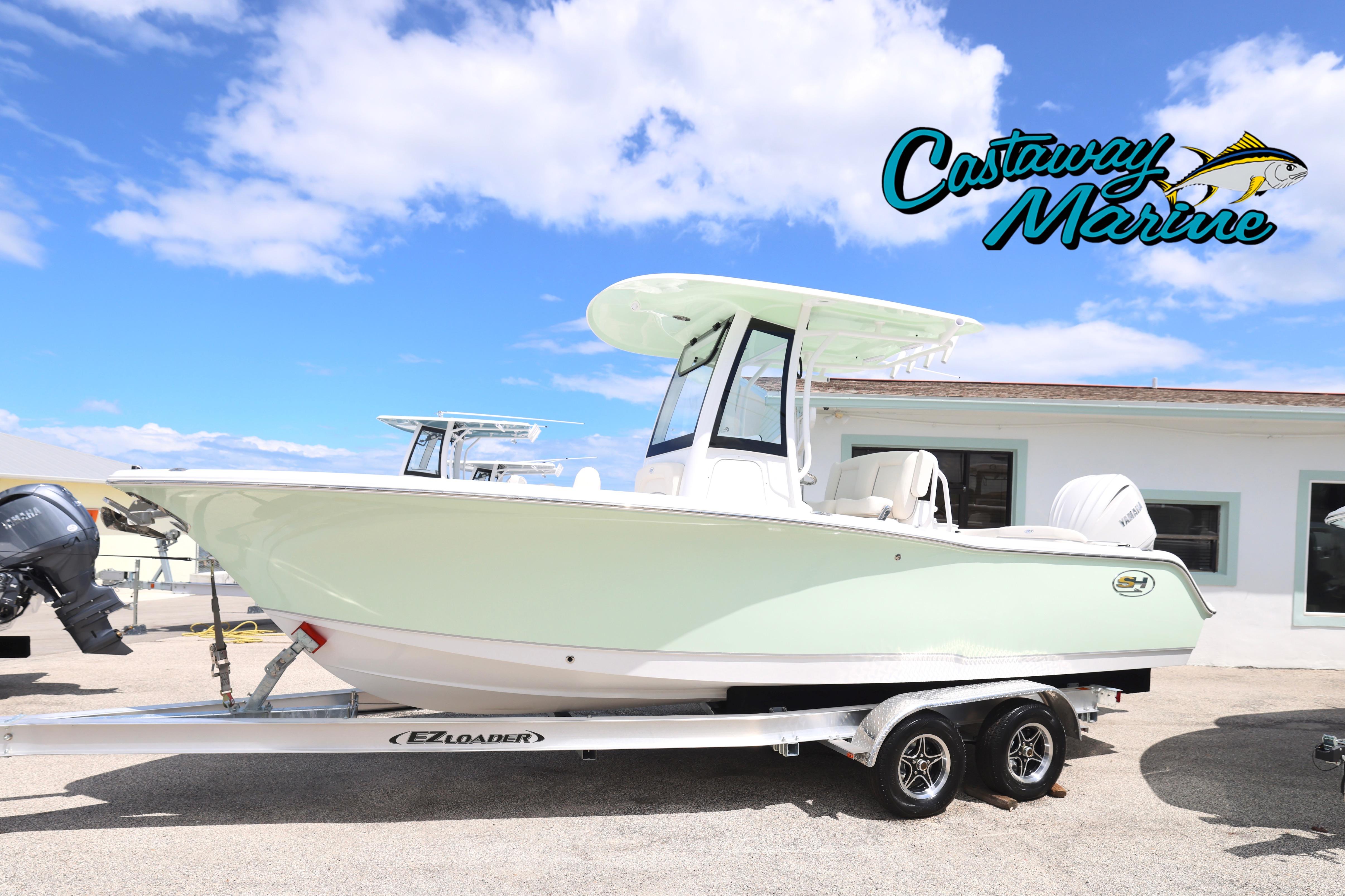 Sea Hunt Ultra 245 SE 2026 Sea Hunt Ultra 245 SE boat on trailer at Castaway Marine dealership.