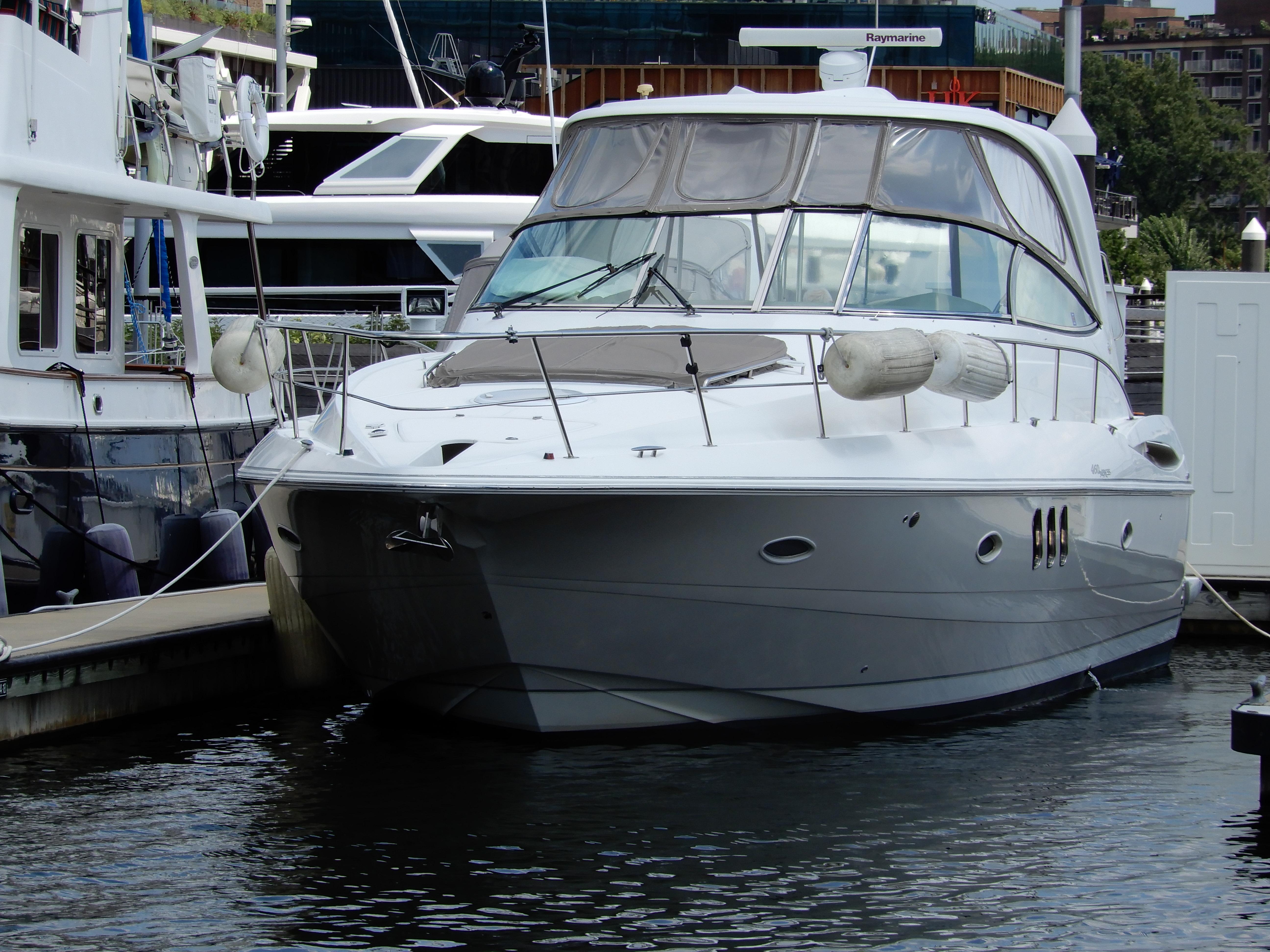 Cruisers Yachts 460 Express 2008 Cruisers Yachts 460 Express docked at marina, front view.