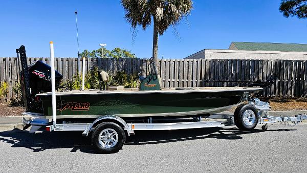 Mako 18 Pro Skiff Backwater Edition 2025 Mako 18 Pro Skiff Backwater Edition on trailer, parked outdoors.
