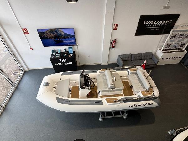 Williams Jet Tenders DieselJet 445 2024 Williams Jet Tenders DieselJet 445 displayed in showroom, featuring sleek design and modern amenities.