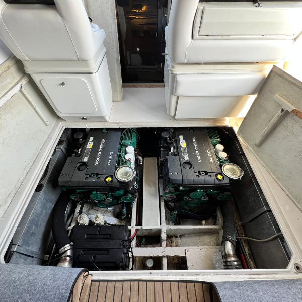 Wellcraft St Tropez 3200 1988 Wellcraft St Tropez 3200 engine compartment with dual engines visible.