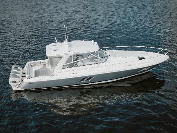 Intrepid 475 Sport Yacht 2018 Intrepid 475 Sport Yacht cruising on calm waters.