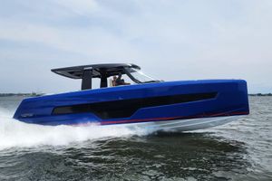 Fjord 41 XL 2023 Fjord 41 XL yacht cruising on open water, showcasing sleek blue design.