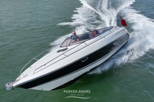 Sunseeker Hawk 31 1997 Sunseeker Hawk 31 speedboat cruising on open water.