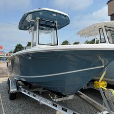 Tidewater 210 CC Adventure 2026 Tidewater 210CC boat on trailer, blue hull, outdoor display.