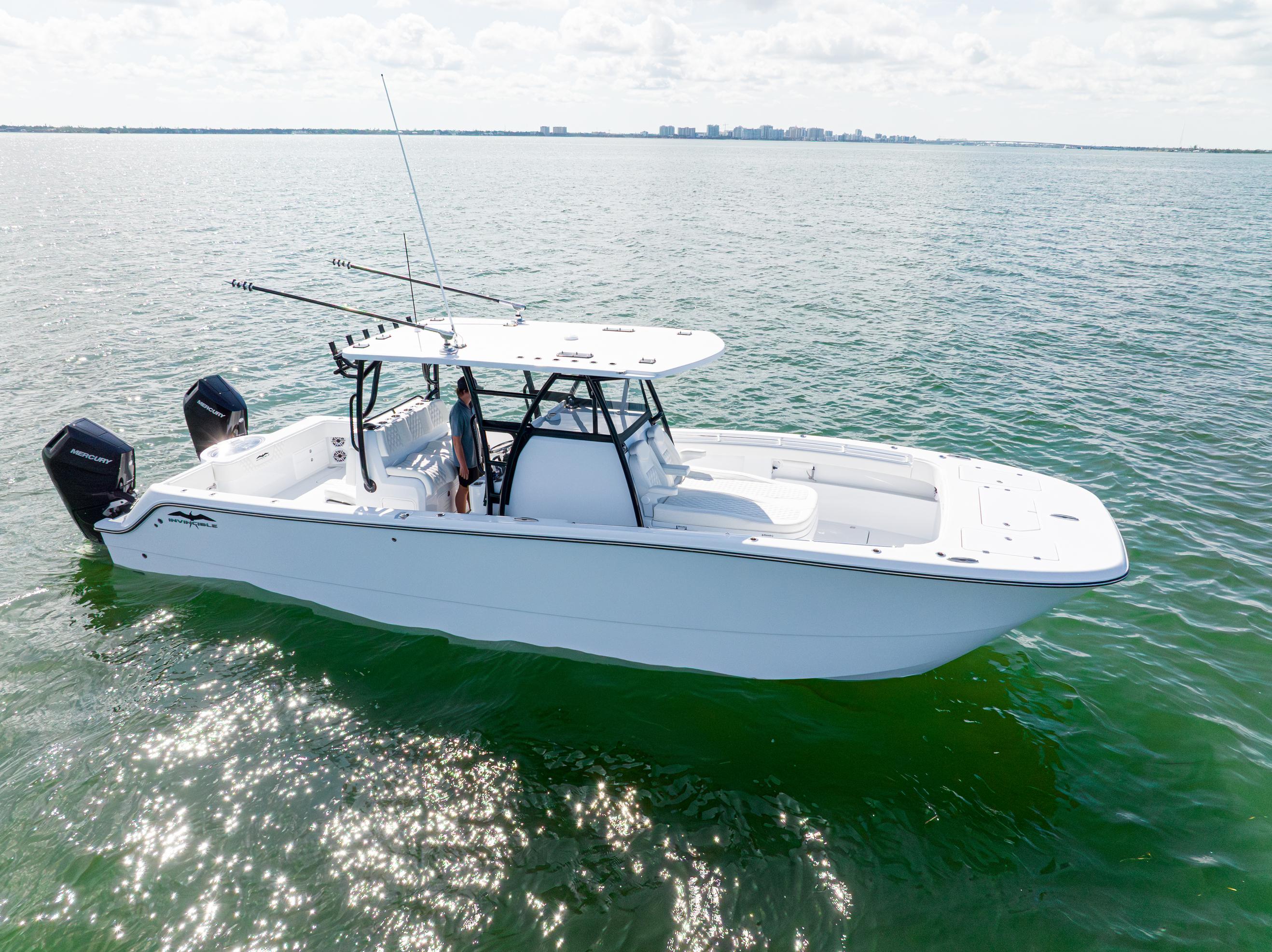 Invincible 33 Catamaran 2026 Invincible 33 Catamaran on calm water, featuring dual outboard motors.