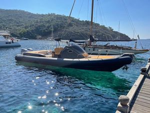 Altamarea WAVE 35 2019 Altamarea WAVE 35 boat docked in clear blue water, scenic background.