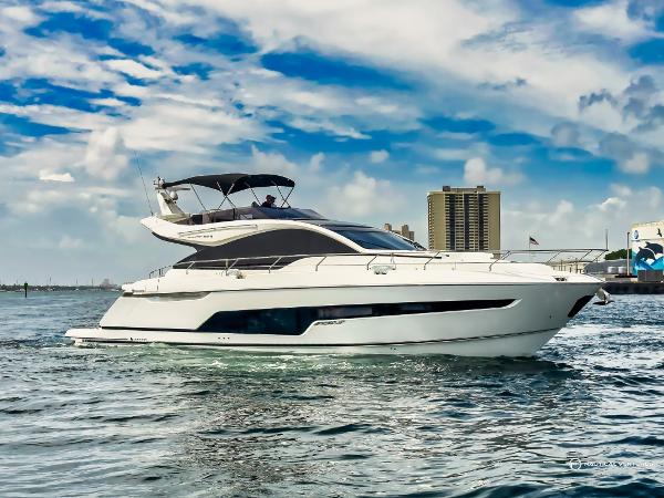 Fairline Phantom 65 2023 Fairline Phantom 65 luxury yacht cruising on open water.