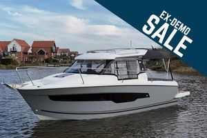 Jeanneau Merry Fisher 695 Series 2 2023 Jeanneau Merry Fisher 695 boat on water, ex-demo sale promotion.