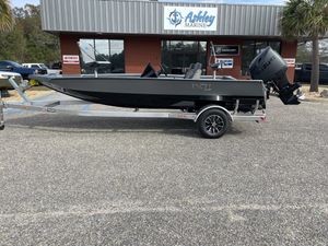 Excel EX 183 2026 Excel EX 183 boat on trailer outside Ashley Marine dealership.