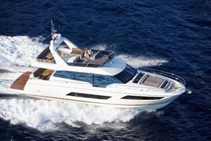 Prestige 680 Luxury 2017 Prestige 680 yacht cruising on open sea.