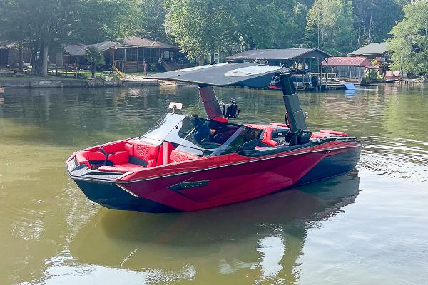 Nautique Super Air Nautique G23 Paragon 2022 Nautique Super Air Nautique G23 Paragon boat on a calm lake.