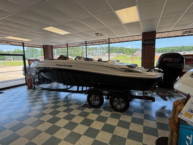 Tahoe T21 2025 Tahoe T21 boat displayed indoors on a trailer.