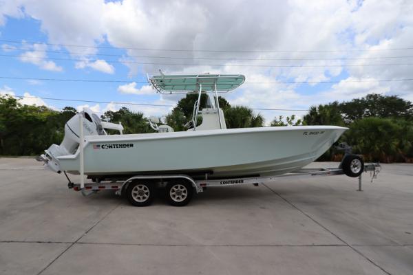 Contender 25 Tournament 2012 Contender 25 Tournament boat on trailer, side view, outdoors.