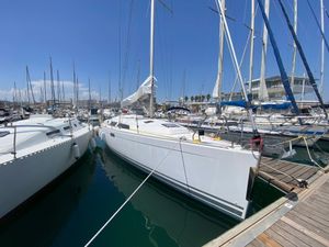 Hanse 350 2007 Hanse 350 sailboat docked at marina under clear blue sky.