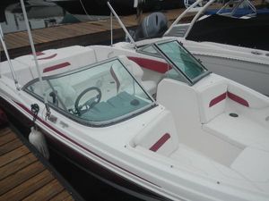 Chaparral 19 H2O Sport 2012 Chaparral 19 H2O Sport boat docked, featuring white and red interior.