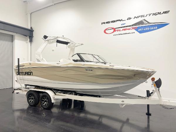 Centurion Nv213 2025 Centurion NV213 boat on trailer in showroom, side view.